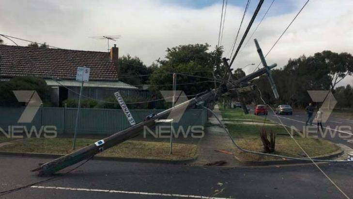 A street pole in Laverton that a hit-run driver crashed into on Saturday, causing power outages. Photo: 7News/Twitter