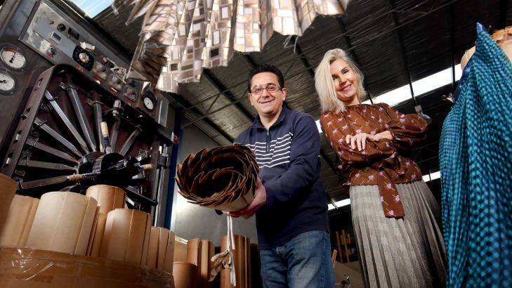 Specialty Pleaters owner Simon Zdraveski with fashion designer Kara Baker who has started a campaign to keep the 80-year-old artisan business from folding.  Photo: Nicole Cleary