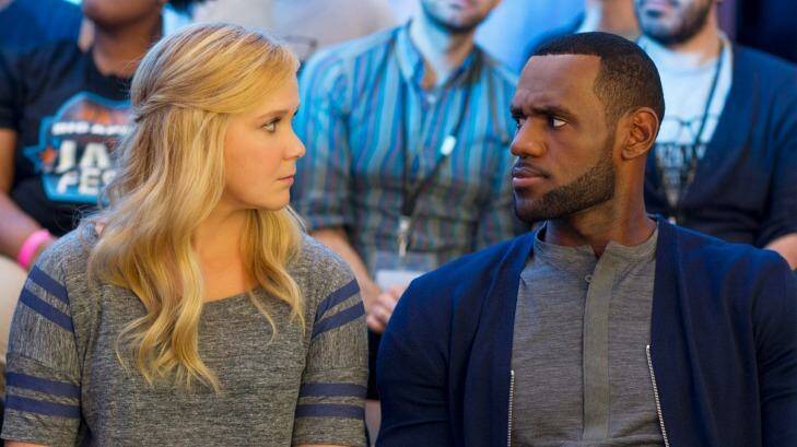 Amy Schumer and LeBron James in a scene from Judd Apatow's latest comedy, <i>Trainwreck</i>.