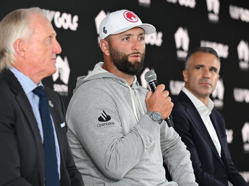 Spanish great Jon Rahm (c) says there's a big reason to expand LIV Golf tournaments to four rounds. (Michael Errey/AAP PHOTOS)