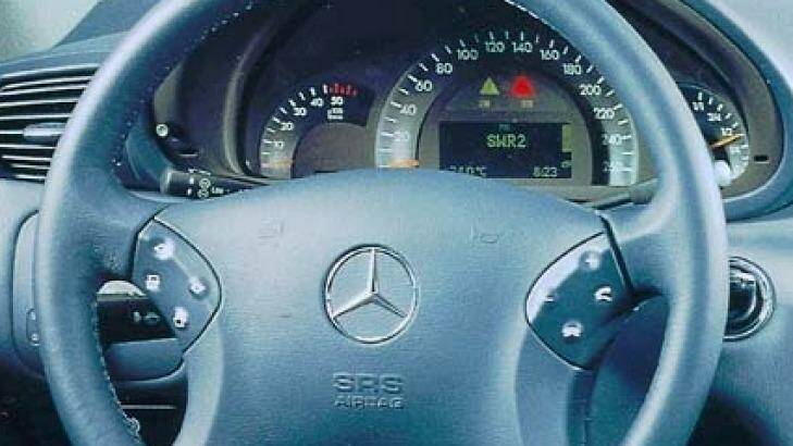 "Not an FJ Holden": The interior of a 2004 Mercedes-Benz coupe. 