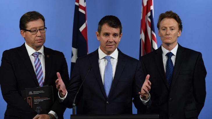 NSW Premier Mike Baird and Deputy Premier Troy Grant with Steve Coleman, CEO of RSPCA NSW  Photo: Peter Rae
