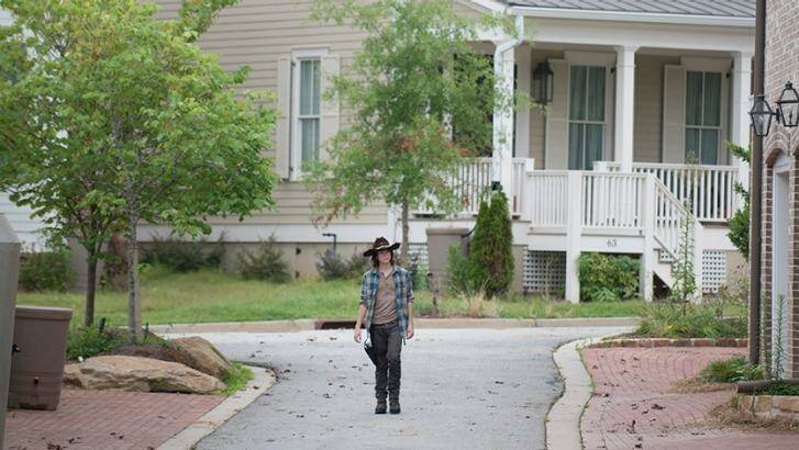 Ron's (Austin Abrams) has Carl (Chandler Riggs) in his sights. Photo: AMC