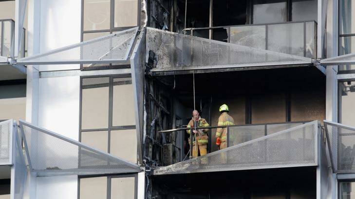 Firefighters at the scene of the Lacrosse building. Photo: Wayne Taylor