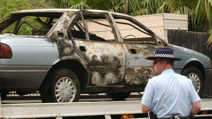 The burnt getaway car used by gunmen to shoot Graham Kinniburgh. Photo: Joe Castro