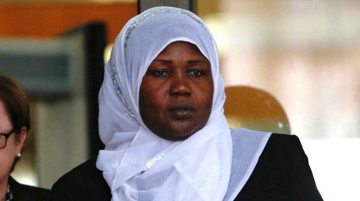 Abook Kon, the aunt of triple murder accused Akon Guode, outside Melbourne Magistrates Court on Monday. Photo: Eddie Jim