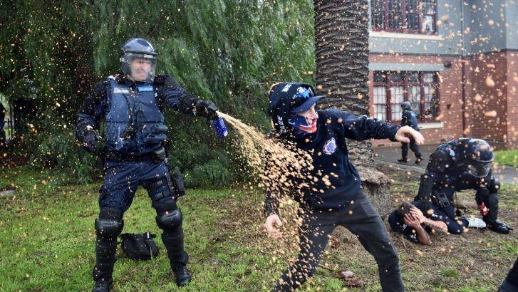 Police deploy capsicum spray as anti-immigration and anti-racism protesters clash in Coburg Photo: Julian Smith
