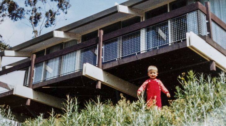Photograph of Alan as a child, in the backyard of their home. Photo: Daniel Pockett