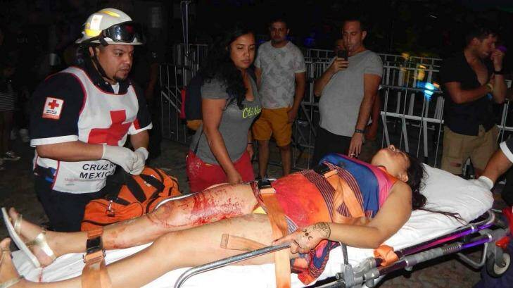 A victim is treated by paramedics. Photo: Esto de Quintana Roo, via AP