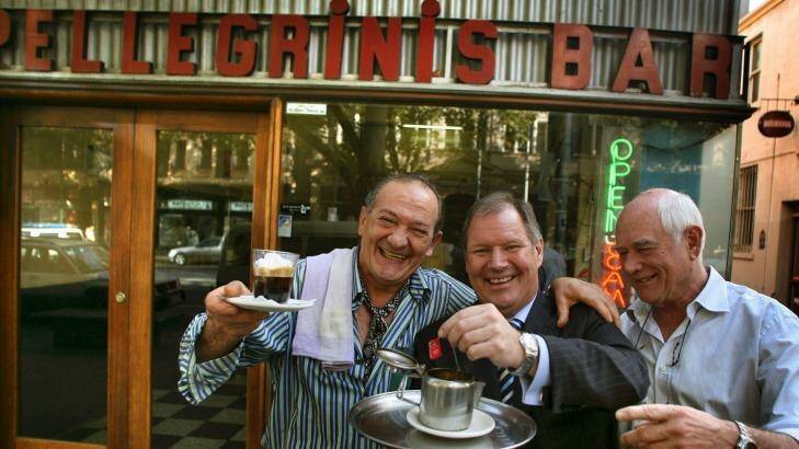 Sisto Malaspina on left and Nino Pangrazio on right co-owners of Pelligrini show Lord Major Robert Doyle the finer points of coffee. Photo: Simon O'Dwyer