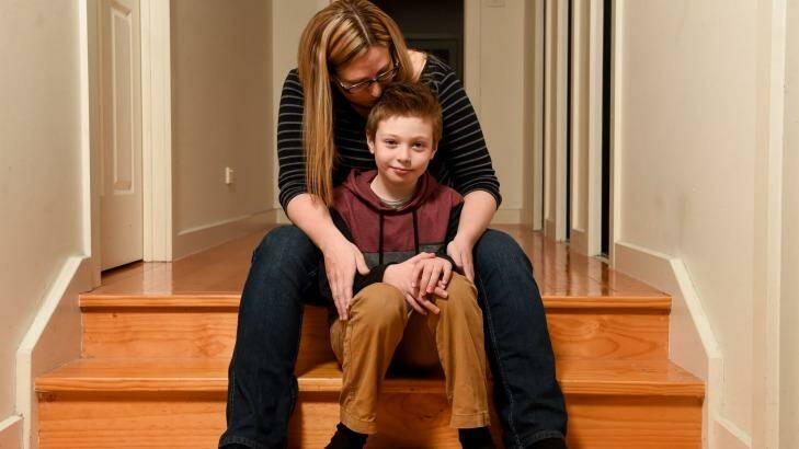 Lisa Whittman with son Lucas, an autistic child with an IQ of 123. Photo: Justin McManus