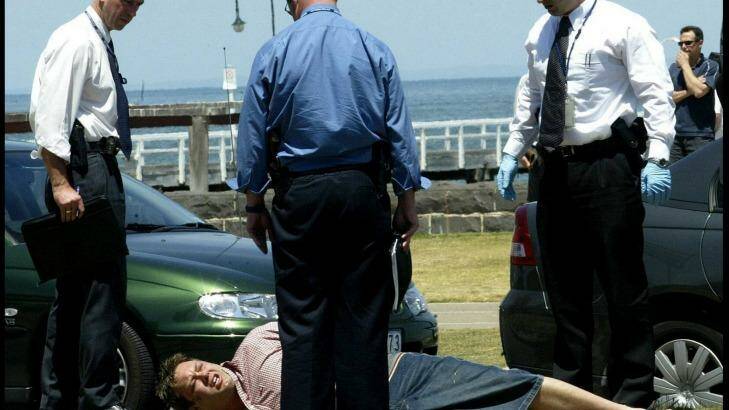 Underbelly's biggest belly: Carl Williams is arrested on Beaconsfield Parade, Port Melbourne.  Photo: Angela Wylie