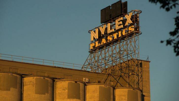 The Nylex sign, and the silos that Caydon want to demolish as part of the next stage of their development.  Photo: Josh Robenstone