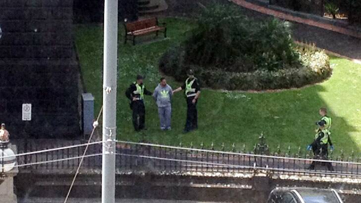 A guest at the Hotel Windsor took a photo of the man being arrested.