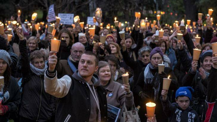 More than 1000 Melburnians gathered at a twilight vigil mourning asylum seekers who have died in their attempt to flee war-torn countries such as Syria. Photo: Luis Ascui