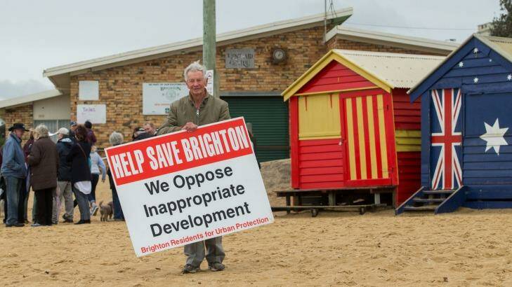Resident and local historian Weston Bate in front of the existing Brighton Lifesaving Club on Sunday.  Photo: Jason South