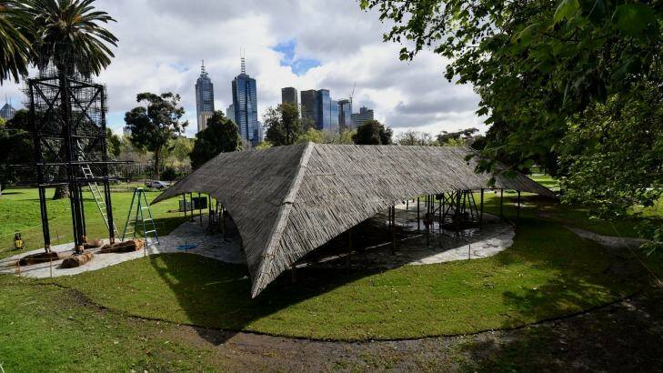 Indian architect Bijoy Jain's MPavilion sits against a backdrop of the city skyline in Melbourne's Queen Victoria Gardens  Photo: Joe Armao