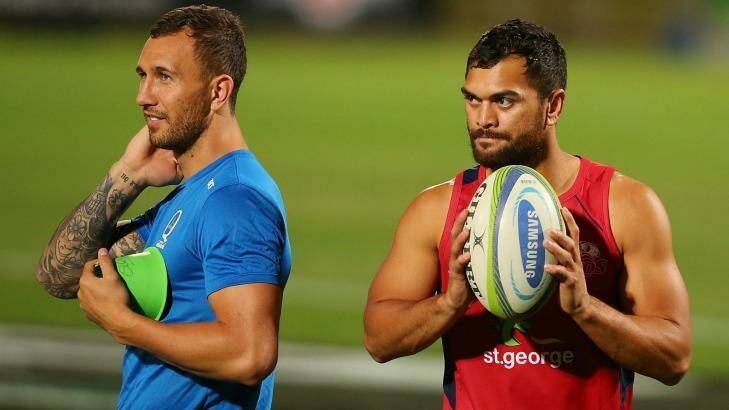 Big two: Quade Cooper with new Reds signing Karmichael Hunt at training.