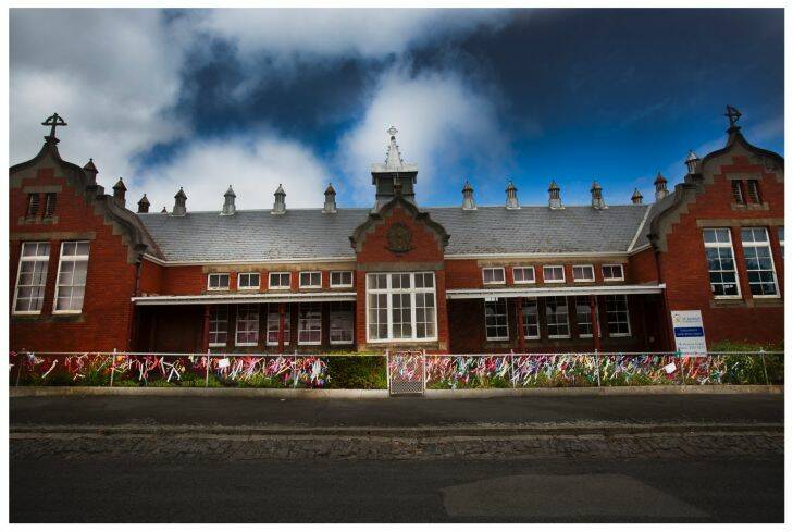 Photograph Simon O'Dwyer. The Age Newspaper. 170216. Photograph Shows. Old St Alipius Boys School now a kindergarten with ribbons tied to the fence to symbolise child abuse in the catholic Church.