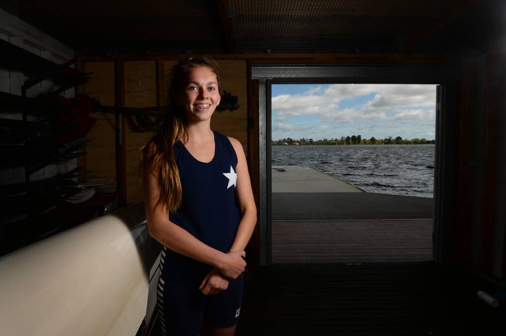 CALLING THE SHOTS: 18-year-old Zoe Wilson was cox of a men's four crew at the World Rowing Masters on Thursday. Pictures - Adam Trafford.
