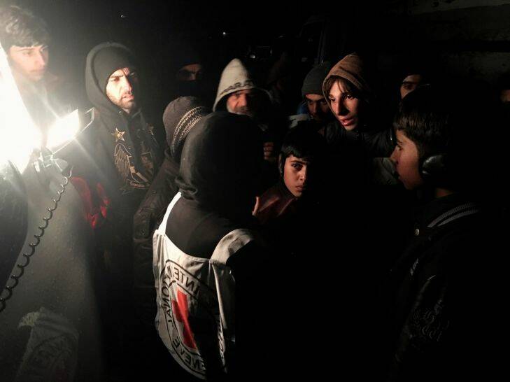 "Fake news" in the Syria war.
Rural Damascus, Madaya. head of ICRC delegation in Syria, Marianne Gasser, speaks to residents as they gathered around an aid convoy.
Photo Australian Red Cross
