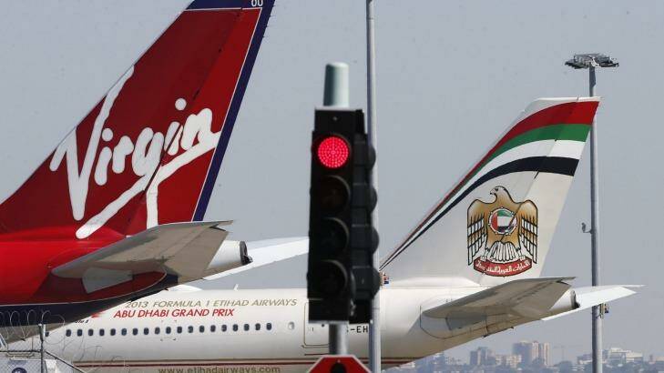 Etihad Airways is yet to decide whether it will back Virgin's $852 million share raising Photo: Daniel Munoz