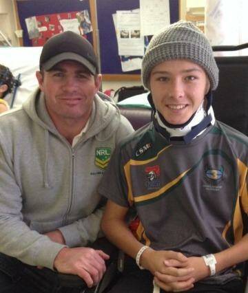 In recovery: Curtis Landers with Bulldogs captain Andrew Ryan. Photo: Facebook