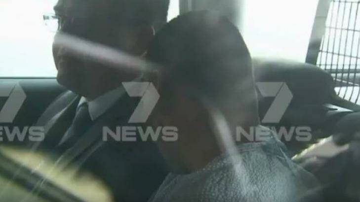 Footage shows a man believed to be Gargasoulas arriving at police headquarters. Photo: Courtesy: @7NewsMelbourne