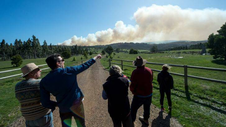 Locals watch the out-of-control Lancefield fire on Wednesday. Photo: Penny Stephens