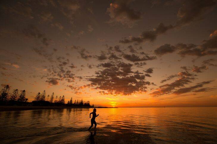 36 degree temeperatures are predicted and some hit the beach ahead of the heat at Altona Beach. 4th March 2016. Photo by Jason South The Age 4/3/2016 Early morning Altona Beach sunrise. Melbourne Generic.  Photo by Jason South