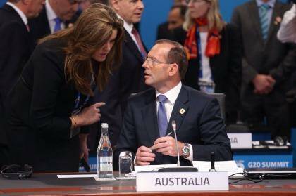 Tony Abbott has hit back at critics of his chief adviser Peta Credlin. Photo: Andrew Meares