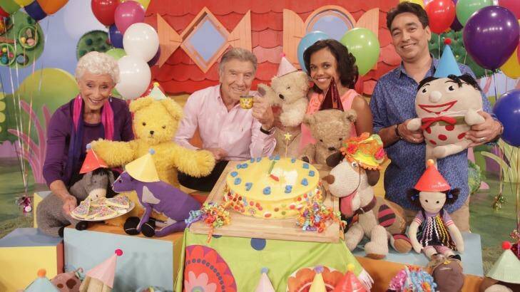 Stories to tell ... Don Spencer with other presenters on set celebrating Play School's 50th year. Photo: Supplied