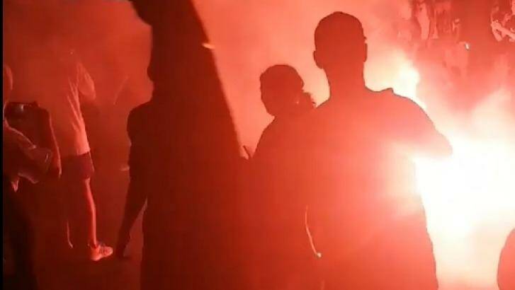 A flare is lit at the Melbourne derby on Saturday night. Photo: Twitter
