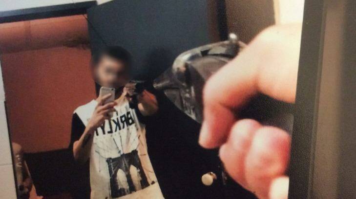 One of Albert Rapovski's friends poses for a selfie with the shotgun. Photo: Supplied
