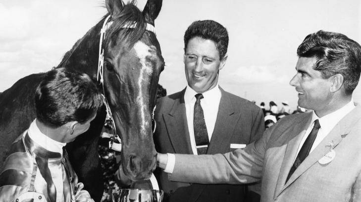 Winning team: Bart Cummings (right) with jockey Roy Higgins, winning horse Red Handed and stable foreman Maurice Yeomans at the 1967 Melbourne Cup. Photo: Supplied