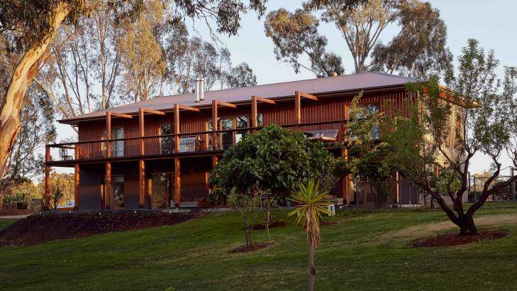 The timber slat exterior at Hide and Seek Winery and Retreat blends with the surrounding gum trees. Photo: Scott Newett