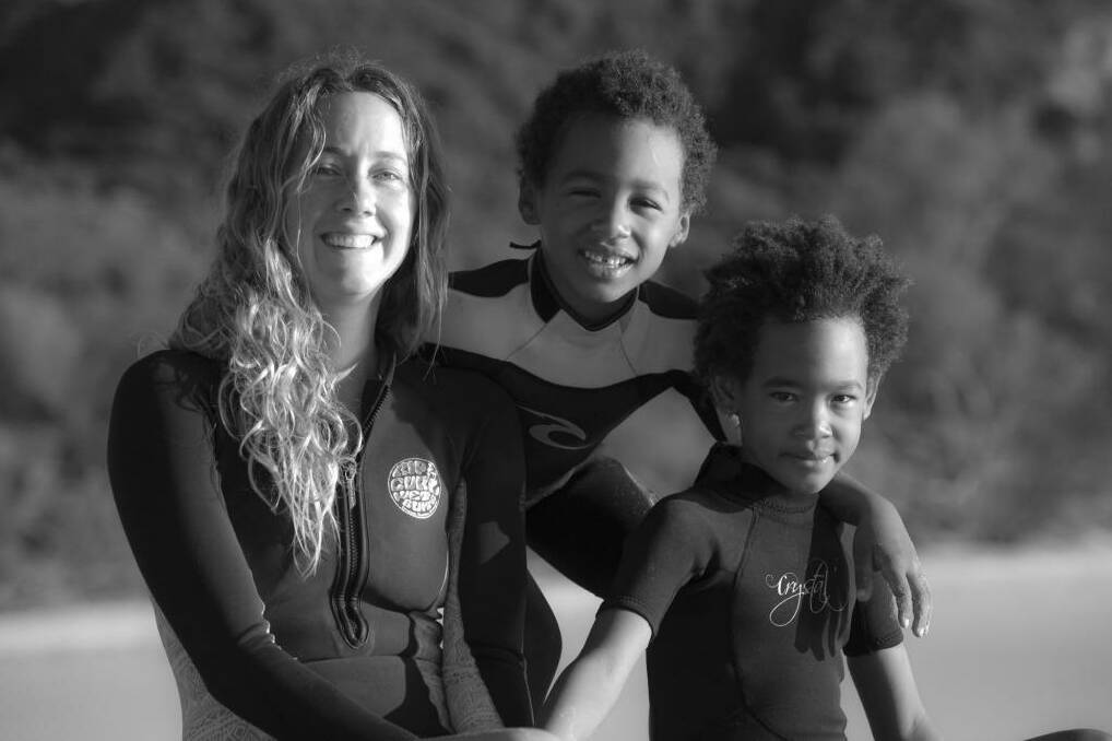 Transcending boundaries: Katie Grubb with students Malaika and Amani Okoth. Photo: Tommy Salmon