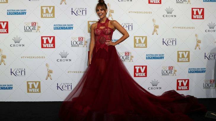 Lauren Phillips wearing a Con Ilio design with a long train, one of the trends on the Logies red carpet. Photo: Robert Cianflone