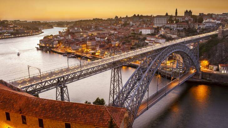 Douro river and city of Porto al sunset, Portugal.