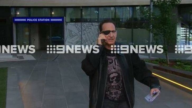 Geoffrey Edelsten was spotted leaving a police station in Melbourne's CBD on Thursday morning. Photo: Channel Nine
