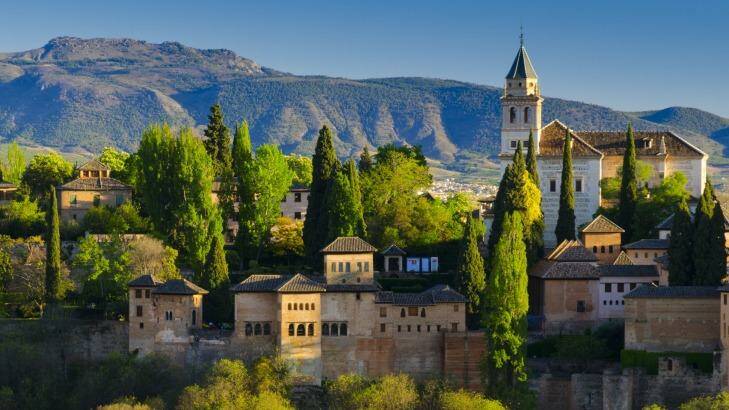 Alhambra Palace and Sierra Nevada mountains, Granada, Spain. Photo: Alan Copson