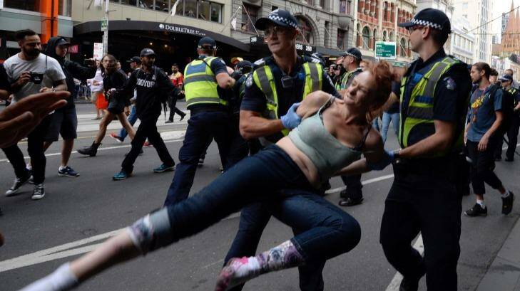 Five people were arrested as police moved to remove the homeless people from Flinders Street on Wednesday.  Photo: Penny Stephens