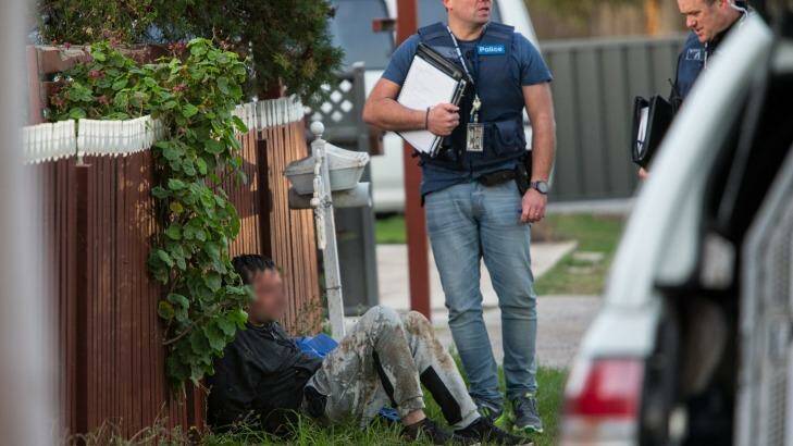 Police arrest a man in St Albans they allege to be connected to a ice trafficking syndicate. Photo: Jason South