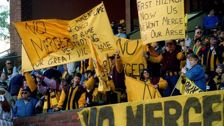Hawthorn supporters attend an anti-merge rally at Glenferrie Oval. Photo: Craig Sillitoe 