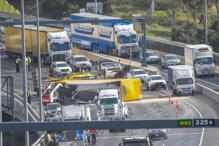 The Age, News 30/05/2017, picture by Justin McManus. Truck rollover on the M80 at Glenroy. It cause traffic congestion for 8 hours before the Ring Road is cleared.