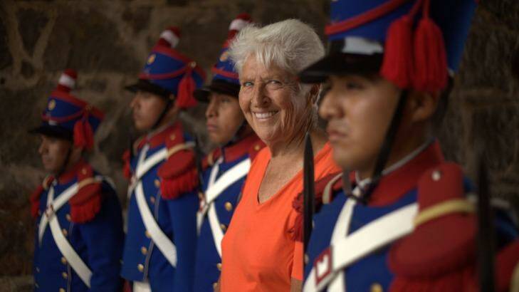 Dawn Fraser was welcomed by the Peruvian Army in traditional dress. Photo: SBS