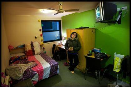 Josephine Lee in an 11.2-square-metre Flinders Street studio apartment. Photo: Simon O'Dwyer SOD