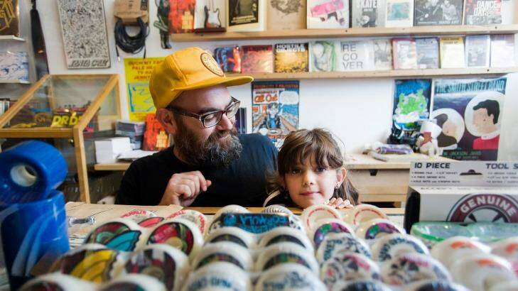Aaron Coping and his eight-year-old daughter Pippa. Pippa goes to work with her father, as he balances a work and parenting life. Photo: Paul Jeffers