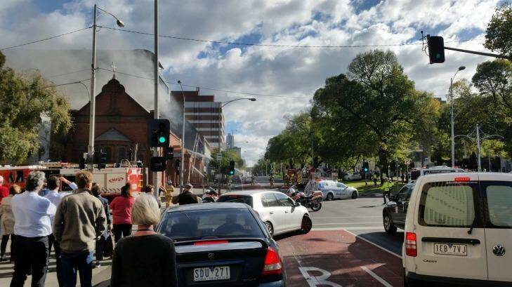 A crowd forms as the blaze is brought under control. Photo: Jarrod Kiven/Facebook