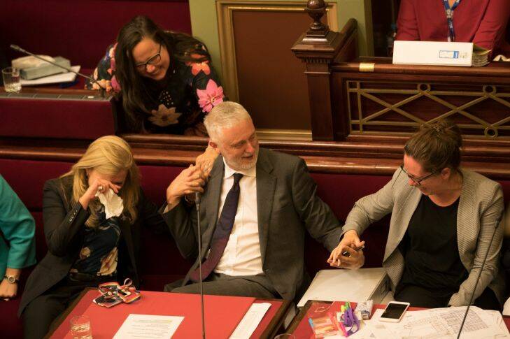 Members of the Victorian Upper house celebrate after a marathon 29 hours sitting to pass the Voluntary Assisted Dying Bill. 22nd November 2017. Photo by Jason South